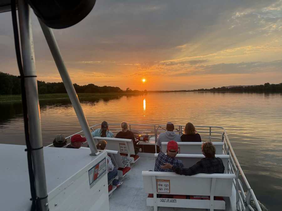 Passengers enjoying a Wild Goose sunset cruise