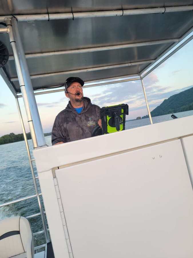 Wild Goose captain aboard the boat