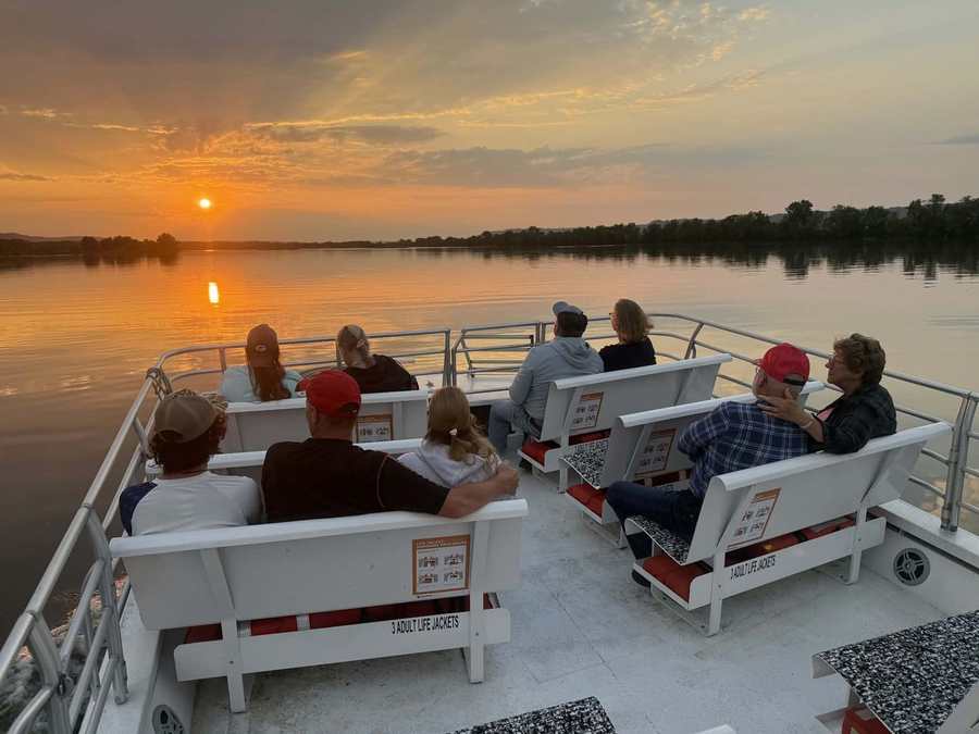 Passengers watching the sunset on the Wild Goose
